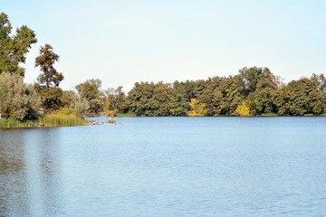 Lake near the park in a medieval city