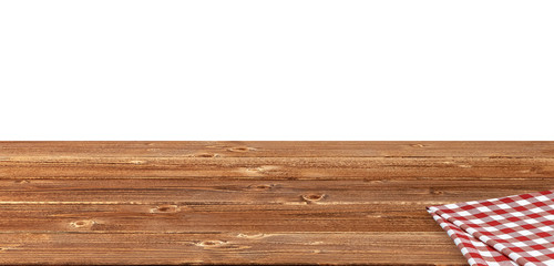 Perspective view of empty wooden table edge with table cloth on white background