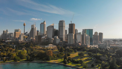 Fototapeta premium SYDNEY, AUSTRALIA - AUGUST 20, 2018: Aerial panoramic view of city harbour. Sydney attracts 20 million tourists annually