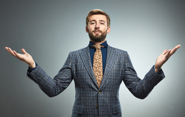 A man in a business suit with different emotions.
