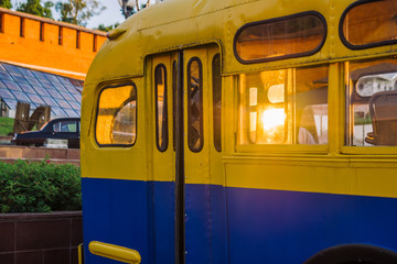 Old blue bus with yellow elements. Museum exhibit at the exhibition of technology
