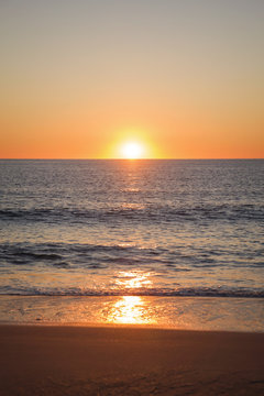 Western Australia – sunset at the Indian Ocean with clear sky at a deserted sandy beach at Cape Leveque