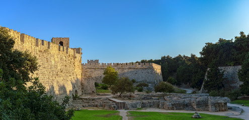 Fototapeta na wymiar Walls of the fortress of the old town of Rhodes on the island of Rhodes in Greece.