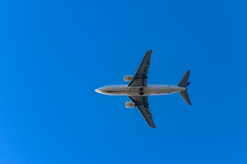 Fototapeta na wymiar Twin turbine airplane in the sky.