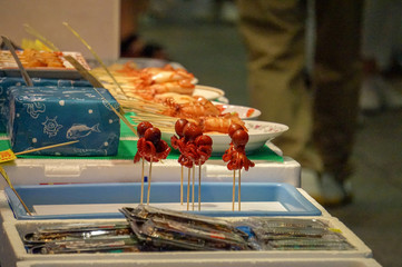 Baby octopus lollipops in Nishiki Market, Kyoto, Japan