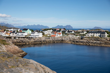 Fototapeta na wymiar Traditional seaside Norwegian houses in the coastal town of Henningsvaer, Norway.