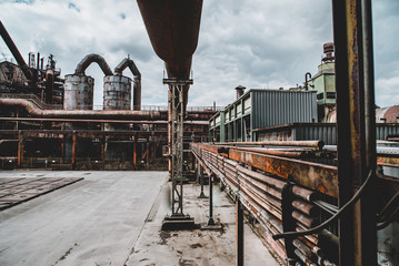 Industrial. Buildings against Cloudy Sky © kimohno