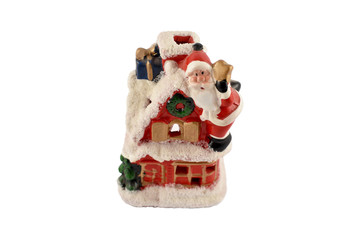 Fototapeta na wymiar Santa Claus figurine stock images. Santa decoration isolated on a white background. Christmas candlelight lamp. Vintage santa candle holder
