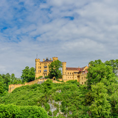 Fototapeta na wymiar BAVARIA, GERMANY - MAY 23, 2018: Castle Schloss Hohenschwangau or Upper Swan County Place is a place in the village of Hohenschwangau near Fussen. Copy space for text.