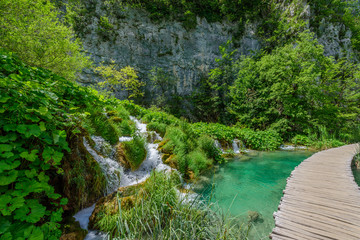 View of waterfalls in the Plitvice Lakes National Park, Croatia. Copy space for text.