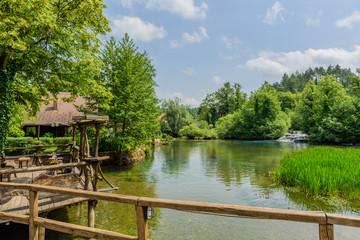 Rastoke village in green nature on Korana river, Croatia. Copy space for text.