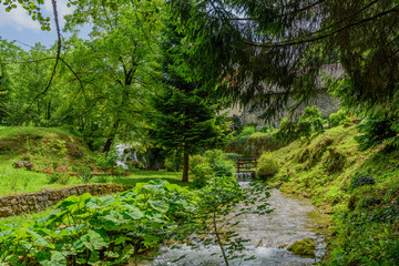 Fototapeta na wymiar Rastoke village in green nature on Korana river, Croatia.