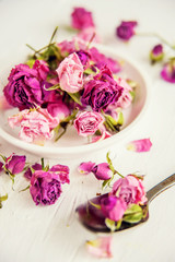 dried herbs flowers (rose) in the Marrakesh street shop, shallow dof