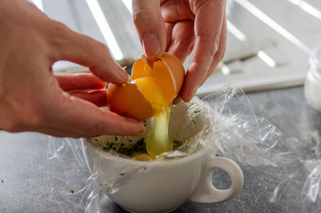 Poaching eggs in plastic wrapper