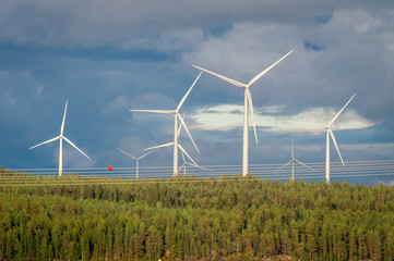 Wind turbines, converting the wind's kinetic energy into electrical energy - ecologically clean...