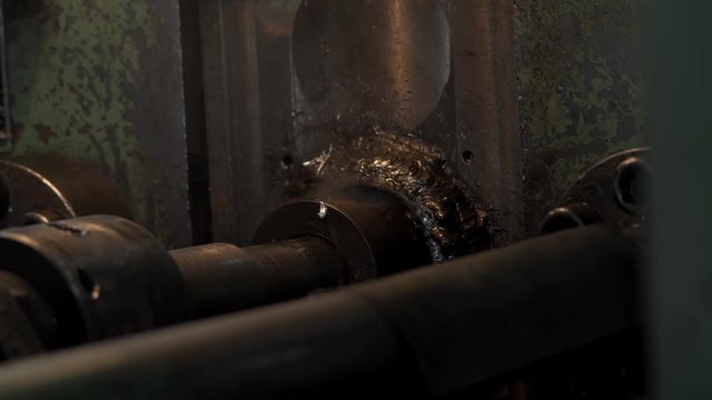 Master Pours Water Into Compartments With Parts