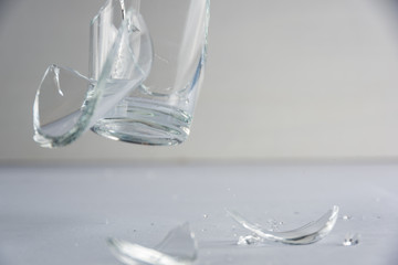 Broken glass and flying pieces of glass