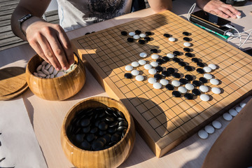 Japanese checkers. Game of Go