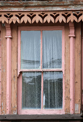 Obraz na płótnie Canvas detail of victorian window on dwelling, Fogo Island, Newfoundland, Canada