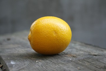 Juicy sour bright yellow beautiful lemon citrus lies on the table