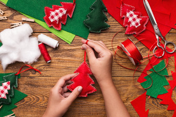 Making of handmade christmas toys from felt - Powered by Adobe