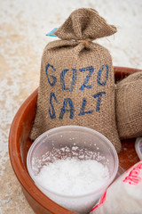 Gozo Salt bags harvested freash for turist to taste near salt pans or salinas. Vertical