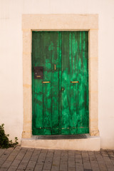 Fototapeta na wymiar Green wooden door, Crete, Greece