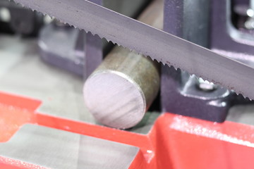 Steel bar cutting by band saw machine