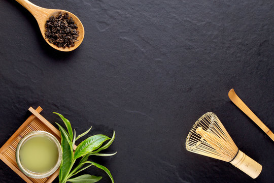 Top view of green tea matcha in a bowl on wooden surface