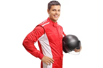 Fotobehang Racer die een helm vasthoudt en glimlacht © Ljupco Smokovski