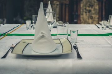 Served table with plate, rustic toned
