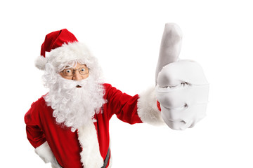 Santa Claus making a thumb up gesture
