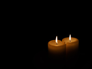 Two candles in the dark