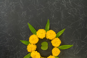 Dashera Festival apta leaf with marigold flower rangoli