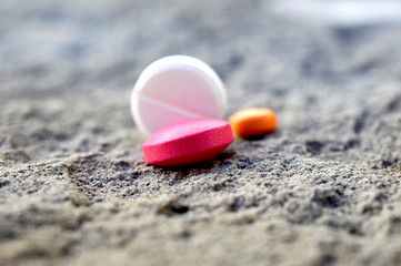 medical pills on a cement background,shallow dof