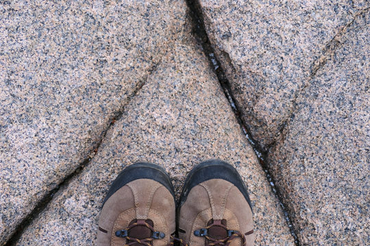 Hikers on Granite at Monument Cove, Acadia National Park, Maine	
