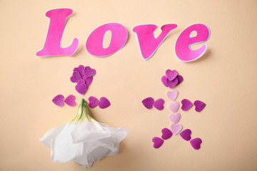 Composition with word LOVE on color background