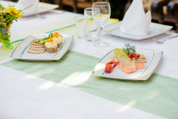 Fish dish and meat dish