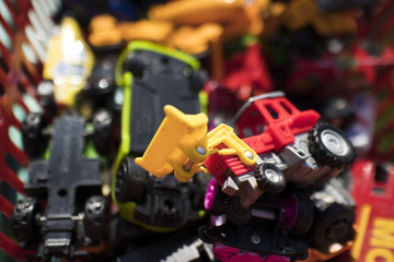 many children's toys-cars, tractors, buses
