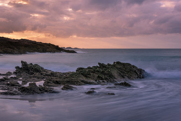 Fototapeta na wymiar French landscape - Bretagne. A beautiful beach nearby Dinard with rocks at sunset.