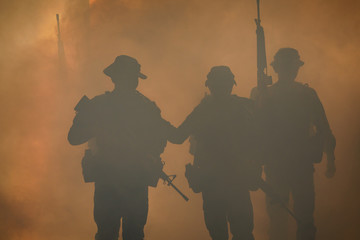 soldiers walkers carry weapon of fire