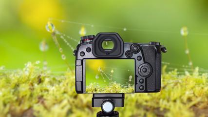 Digital camera on Macro waterdrop background 1