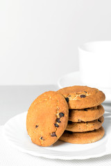 Oatmeal cookies with chocolate pieces on a plate