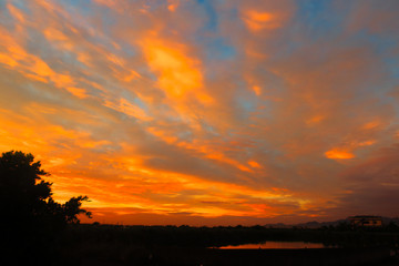 Fototapeta na wymiar Warm sunrise clouds