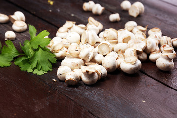 raw fresh  mushrooms on rustic table. white fresh mushroom