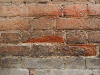 close-up wall of red brick