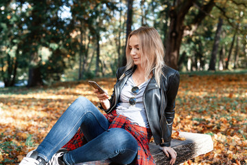 young woman enjoying autumn outdoors