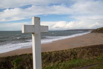 The cross near loe bar in cornwall england uk near the coast 