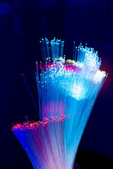 optical fibres dinamic flying from deep on technology background