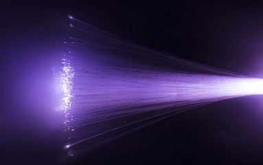 Fototapeta na wymiar optical fibres dinamic flying from deep on technology background